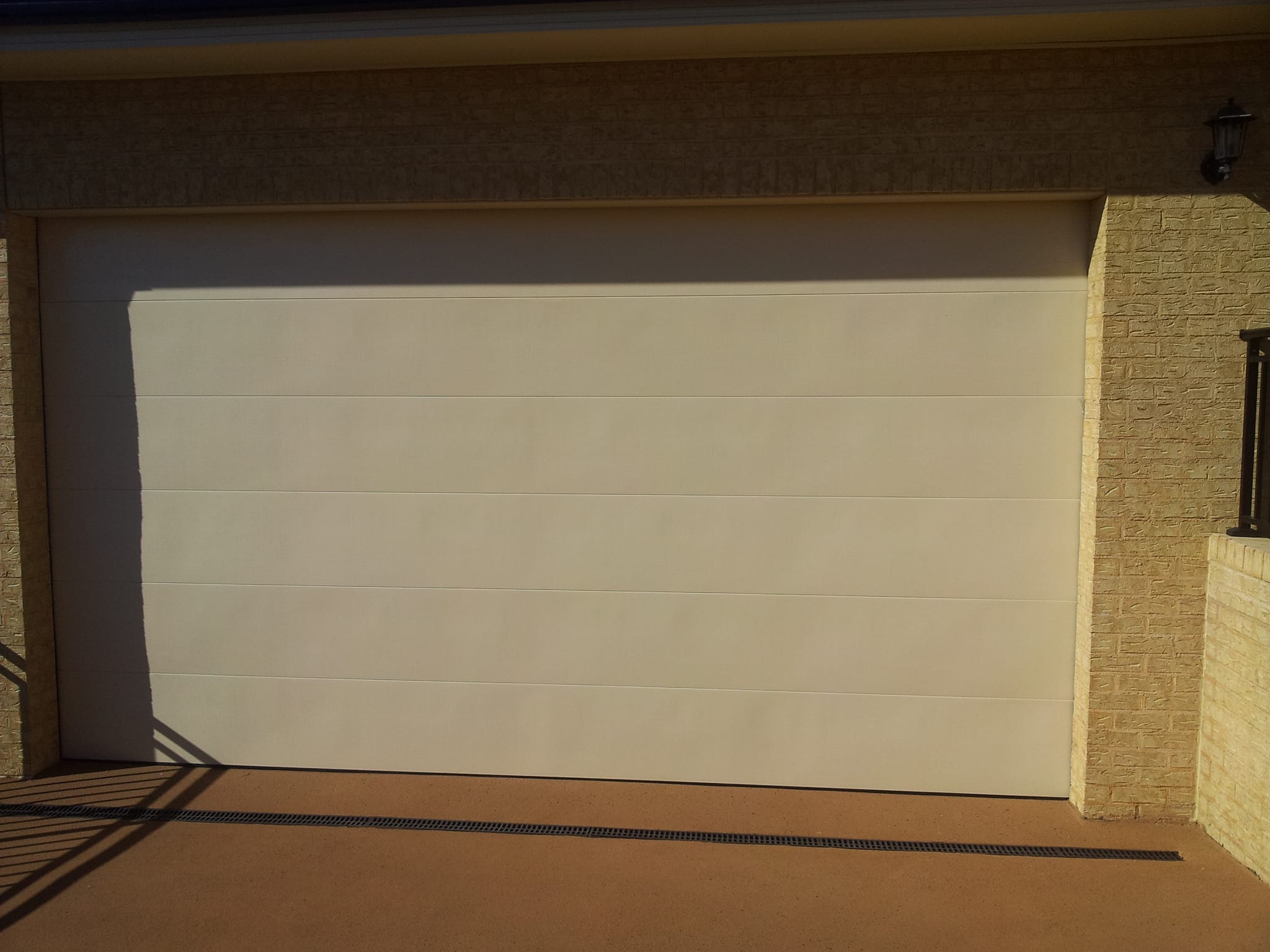 A garage door repaired and rebalanced by Doormec in the Illawarra