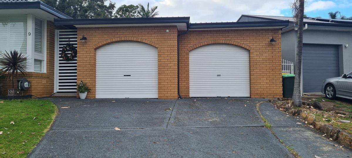 Garage doors before replacement by Doormec in the Illawarra